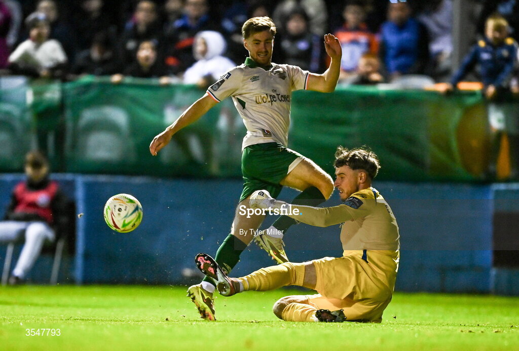 21 August 2026; Barry Baggley of St Patrick's Athletic is tackled by Drogheda United goalkeeper Luke Dennison during the SSE Airtricity Men’s Premier Division match between Drogheda United and St Patrick's Athletic at Sullivan & Lambe Park in Drogheda, Louth. Photo by Tyler Miller/Sportsfile