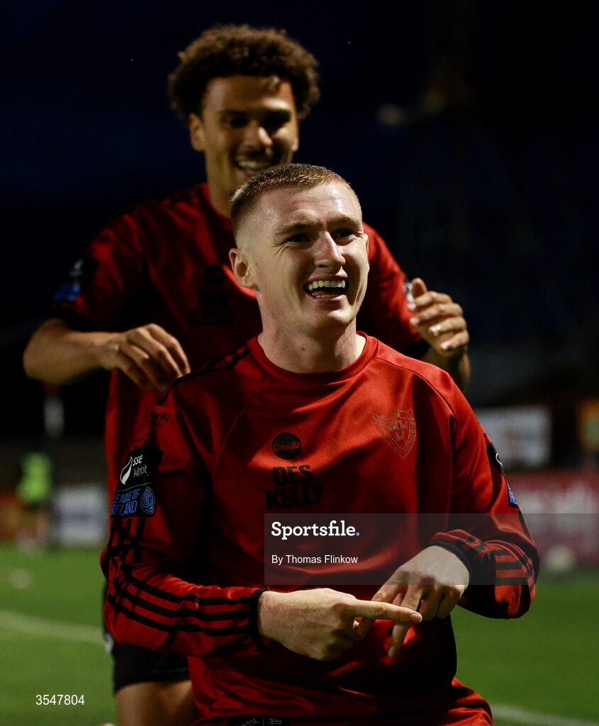 21 August 2026; Ross Tierney of Bohemians, front,  celebrates with teammate Zane Myers after scoring his side's fourth goal during the SSE Airtricity Men’s Premier Division match between Bohemians and Derry City at Dalymount Park in Dublin. Photo by Thomas Flinkow/Sportsfile