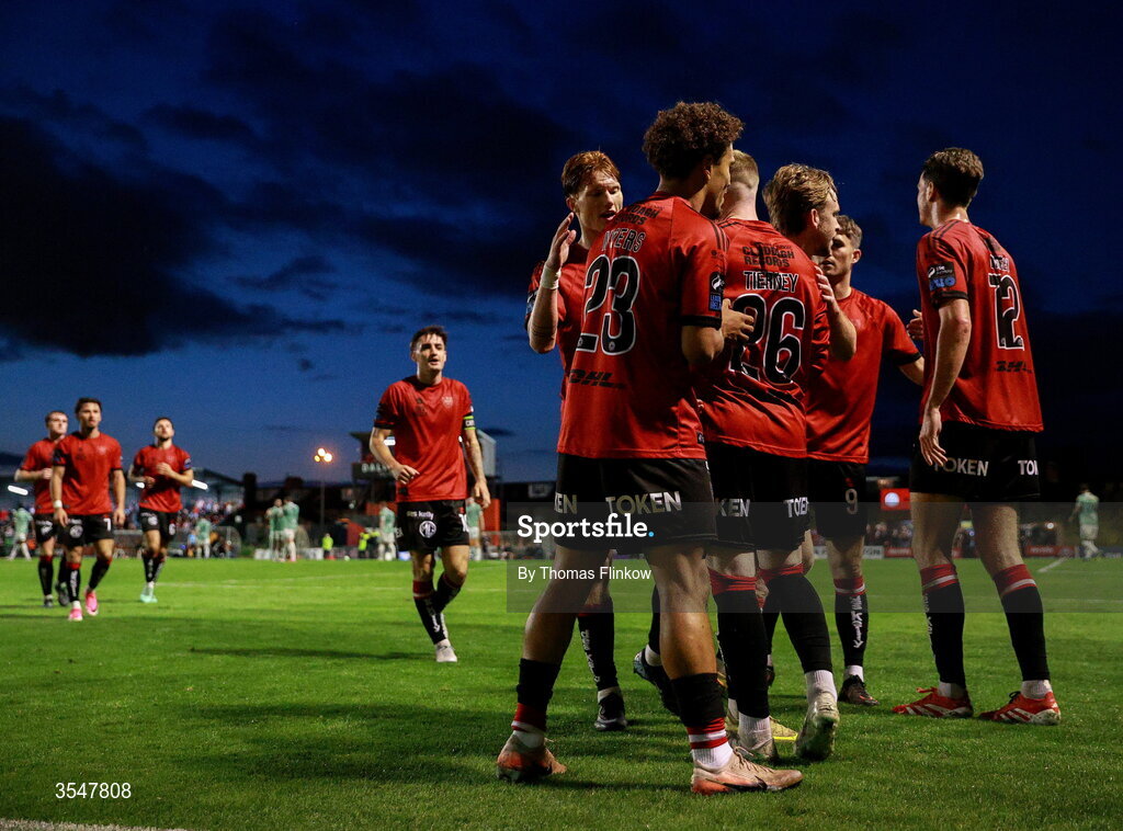 21 August 2026; Ross Tierney of Bohemians, 26, celebrates with teammates after scoring his side's fourth goal during the SSE Airtricity Men’s Premier Division match between Bohemians and Derry City at Dalymount Park in Dublin. Photo by Thomas Flinkow/Sportsfile