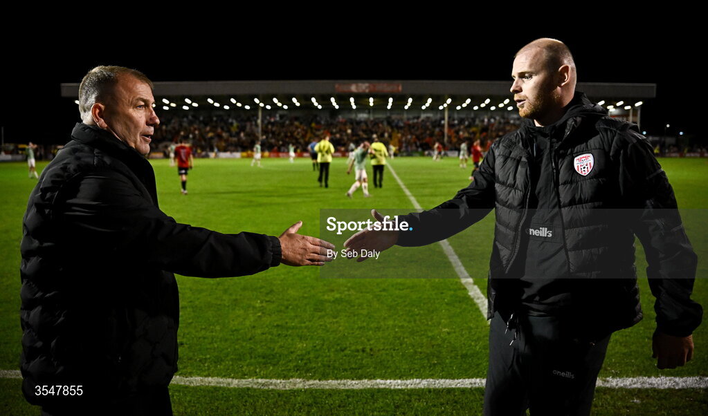 21 August 2026; Bohemians manager Alan Reynolds, left, and Derry City interim manager Mark Connolly shake hands after the SSE Airtricity Men’s Premier Division match between Bohemians and Derry City at Dalymount Park in Dublin. Photo by Seb Daly/Sportsfile