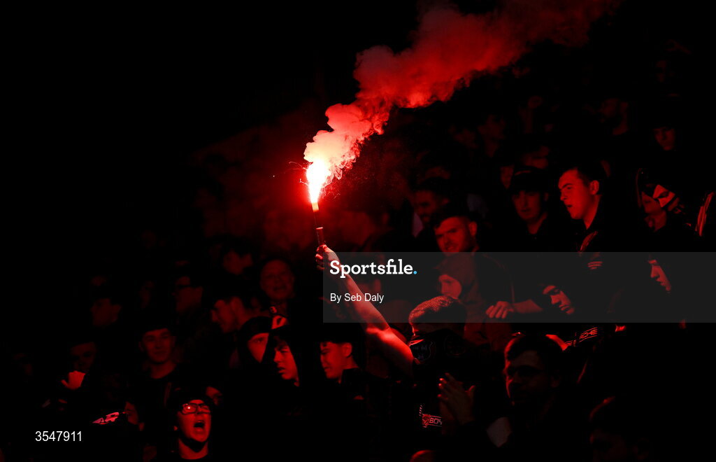 21 August 2026; A Bohemians supporter holds up a flare during the SSE Airtricity Men’s Premier Division match between Bohemians and Derry City at Dalymount Park in Dublin. Photo by Seb Daly/Sportsfile