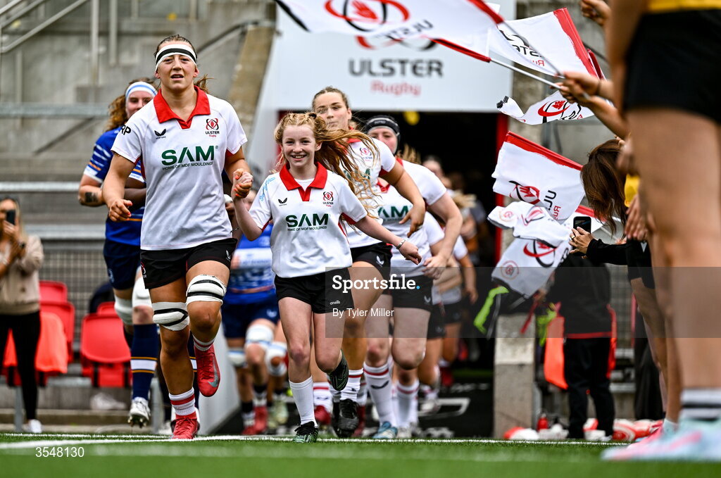 22 August 2026; Claire Boles of Ulster leads her side onto the pitch before the Vodafone Womens Interprovincial Championship Round 3 match between Ulster and Leinster at Affidea Stadium in Belfast. Photo by Tyler Miller/Sportsfile