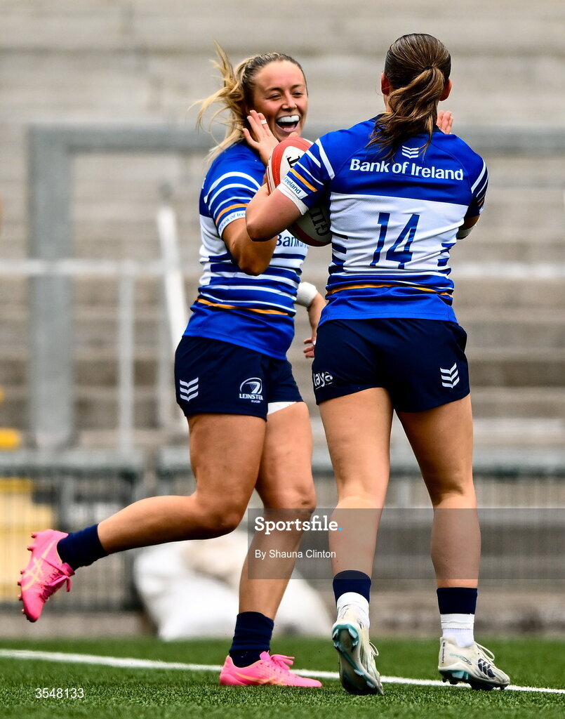 22 August 2026; Robyn O'Connor of Leinster, right, celebrates with team-mate Stacey Flood after scoring her side's first try during the Vodafone Womens Interprovincial Championship Round 3 match between Ulster and Leinster at Affidea Stadium in Belfast. Photo by Shauna Clinton/Sportsfile