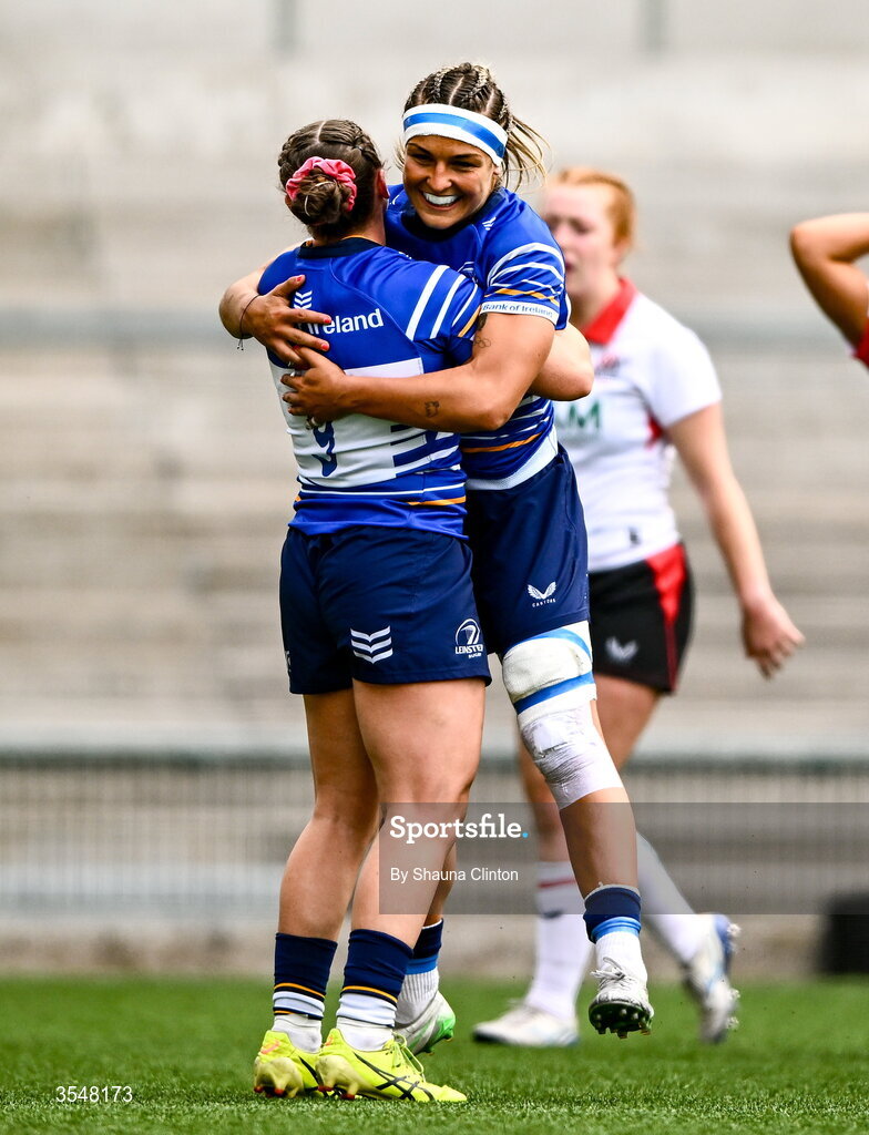 22 August 2026; Katie Whelan of Leinster, left, is congratulated by team-mate Erin King after scoring her side's fifth try during the Vodafone Womens Interprovincial Championship Round 3 match between Ulster and Leinster at Affidea Stadium in Belfast. Photo by Shauna Clinton/Sportsfile