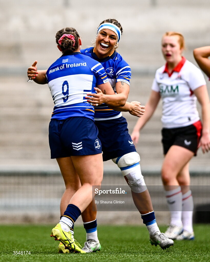 22 August 2026; Katie Whelan of Leinster, left, is congratulated by team-mate Erin King after scoring her side's fifth try during the Vodafone Womens Interprovincial Championship Round 3 match between Ulster and Leinster at Affidea Stadium in Belfast. Photo by Shauna Clinton/Sportsfile