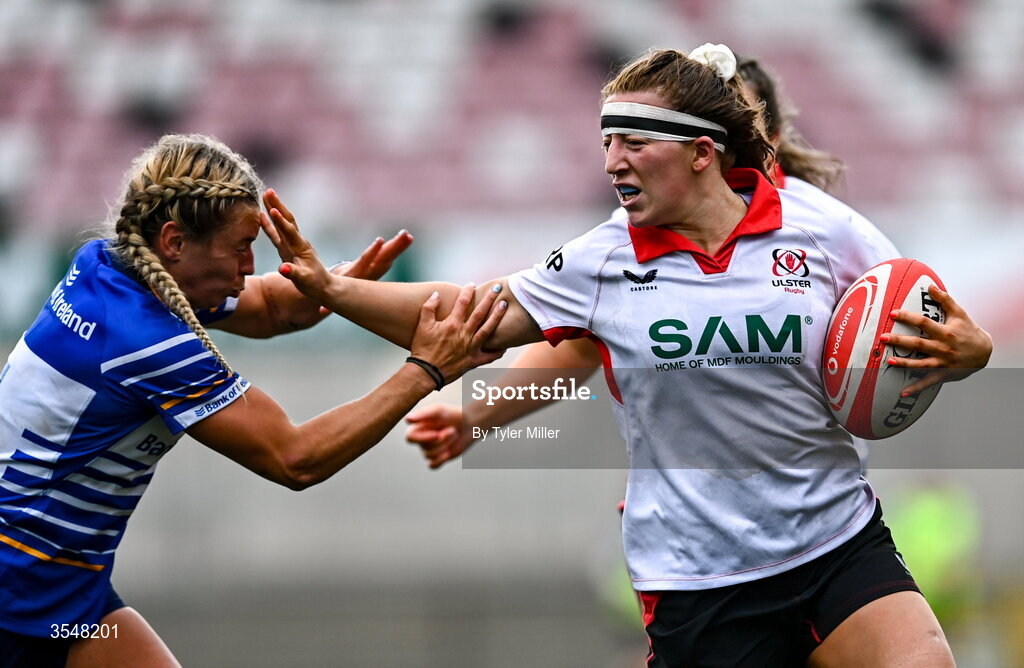 22 August 2026; Claire Boles of Ulster in action against Kathy Baker of Leinster during the Vodafone Womens Interprovincial Championship Round 3 match between Ulster and Leinster at Affidea Stadium in Belfast. Photo by Tyler Miller/Sportsfile