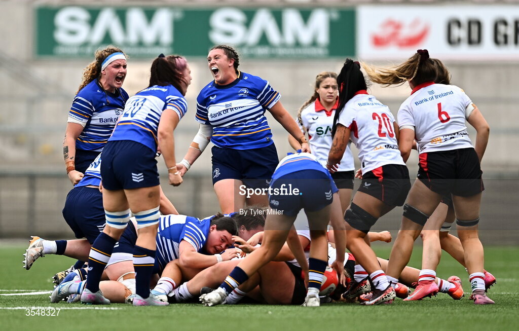 22 August 2026; Hannah Wilson, centre, and Ruth Campbell of Leinster, left, celebrate a turnover during the Vodafone Womens Interprovincial Championship Round 3 match between Ulster and Leinster at Affidea Stadium in Belfast. Photo by Tyler Miller/Sportsfile