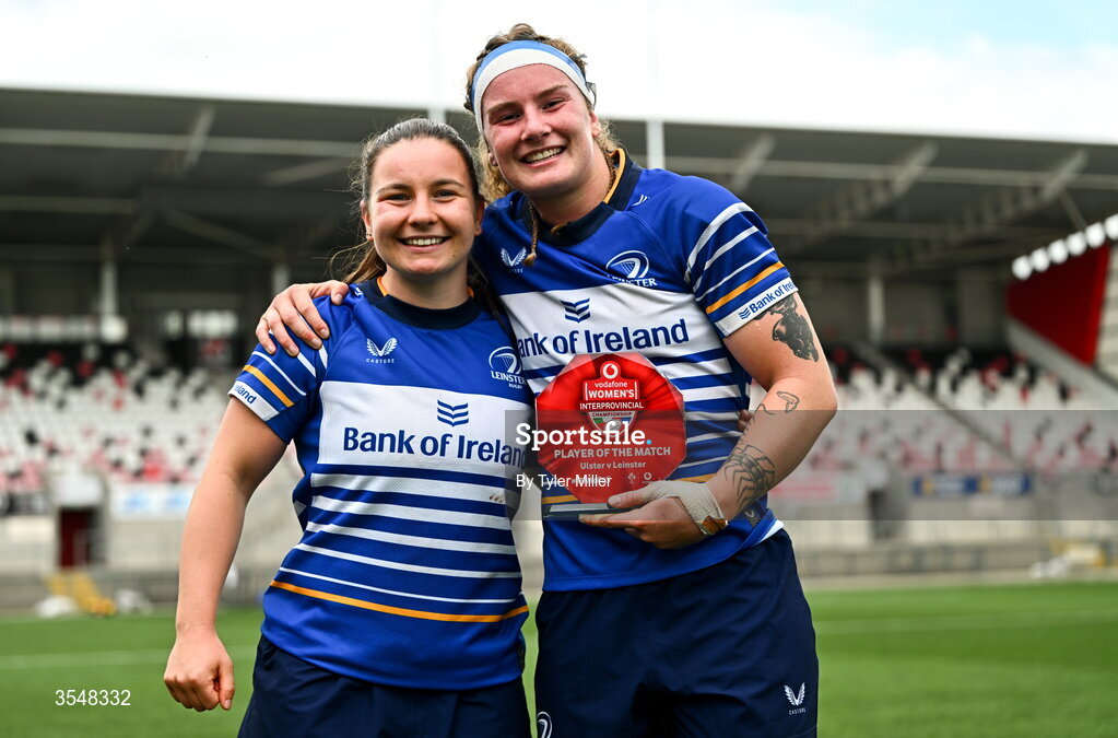 22 August 2026; Ruth Campbell of Leinster, right, is presented with the player of the match award by teammate Sarah Delaney after the Vodafone Womens Interprovincial Championship Round 3 match between Ulster and Leinster at Affidea Stadium in Belfast. Photo by Tyler Miller/Sportsfile