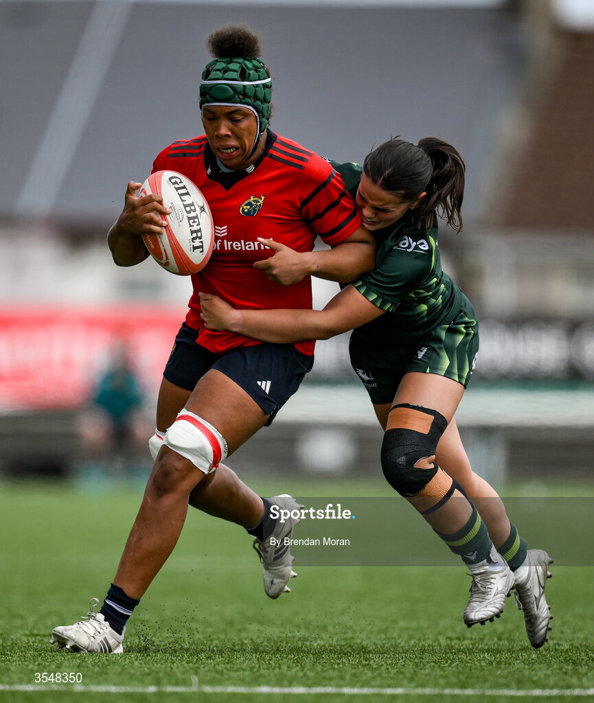22 August 2026; Grace Moore of Munster is tackled by Clara Barrett of Connacht during the Vodafone Womens Interprovincial Championship Round 3 match between Connacht and Munster at Dexcom Stadium in Galway. Photo by Brendan Moran/Sportsfile
