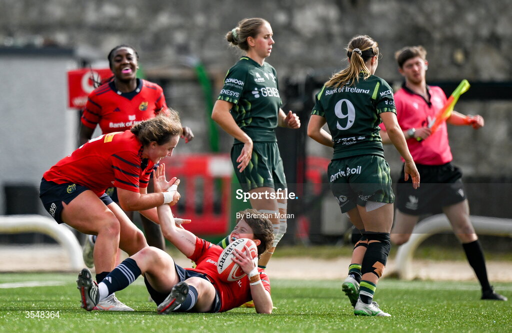 22 August 2026; Caitríona Finn of Munster celebrates with teammate Enya Breen, left, after scoring their side's third try during the Vodafone Womens Interprovincial Championship Round 3 match between Connacht and Munster at Dexcom Stadium in Galway. Photo by Brendan Moran/Sportsfile