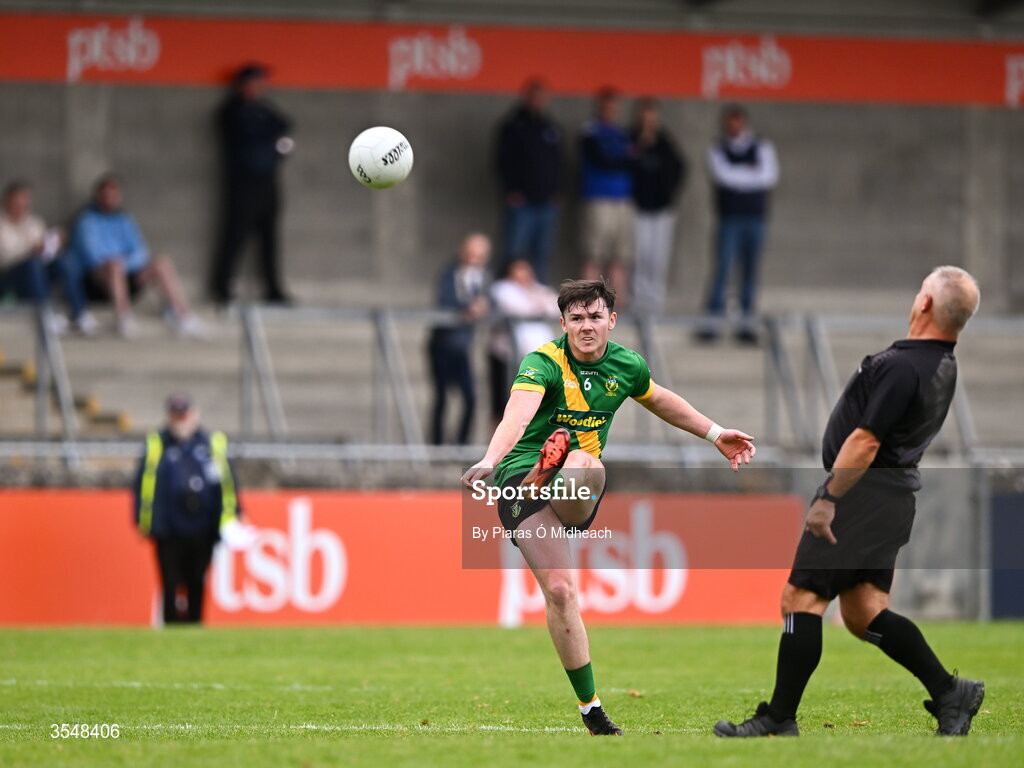 22 August 2026; Adam Waddick of Thomas Davis shoots as referee PJ Murray looks on during the PTSB Dublin Senior Club Football Championships Round 2 match between Skerries Harps and Thomas Davis at Parnell Park in Dublin. Photo by Piaras Ó Mídheach/Sportsfile