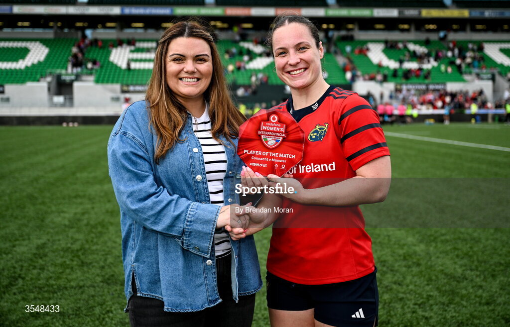 22 August 2026; Alana McInerney of Munster is presented with the Vodafone Player of the Match award by Nikki Hall of Vodafone after the Vodafone Womens Interprovincial Championship Round 3 match between Connacht and Munster at Dexcom Stadium in Galway. Photo by Brendan Moran/Sportsfile