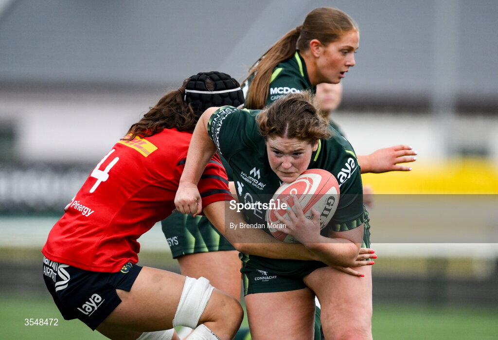 22 August 2026; Emma Fabby of Connacht is tackled by Aoibhe O’Flynn of Munster during the Vodafone Womens Interprovincial Championship Round 3 match between Connacht and Munster at Dexcom Stadium in Galway. Photo by Brendan Moran/Sportsfile