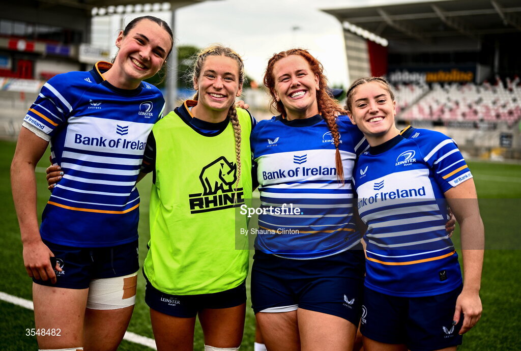 22 August 2026; Leinster players, from left, Niamh Murphy, Kathy Baker, Caoimhe Molloy and Katie Whelan after their side's victory in the Vodafone Womens Interprovincial Championship Round 3 match between Ulster and Leinster at Affidea Stadium in Belfast. Photo by Shauna Clinton/Sportsfile
