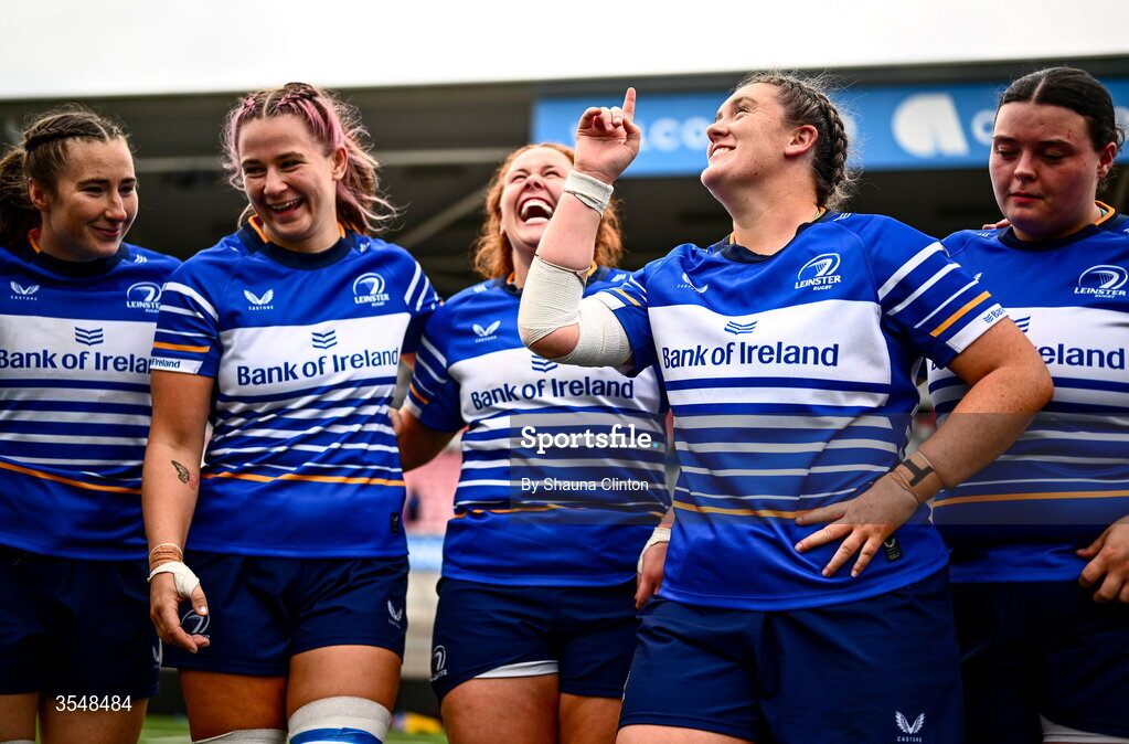 22 August 2026; Hannah Wilson of Leinster, right, and team-mates celebrate after the Vodafone Womens Interprovincial Championship Round 3 match between Ulster and Leinster at Affidea Stadium in Belfast. Photo by Shauna Clinton/Sportsfile