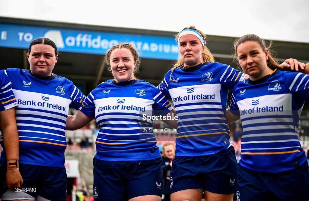 22 August 2026; Leinster players, from left, Hope Lowney, Emma-Jane Wilson, Ruth Campbell and Sarah Delaney after the Vodafone Womens Interprovincial Championship Round 3 match between Ulster and Leinster at Affidea Stadium in Belfast. Photo by Shauna Clinton/Sportsfile