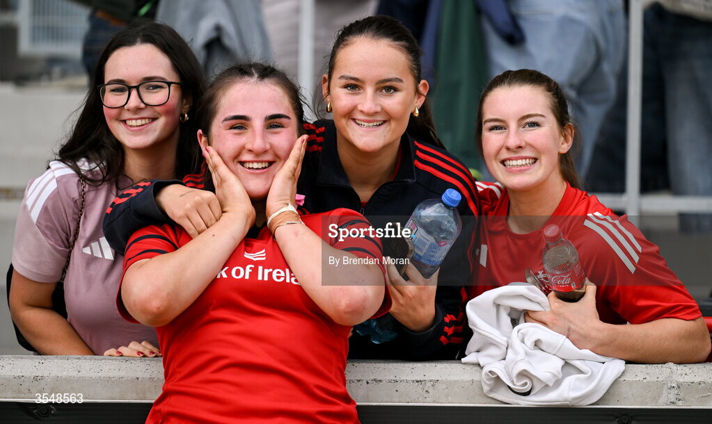 22 August 2026; Niamh O'Mahony of Munster celebrates with her friends after making her debut in the Vodafone Womens Interprovincial Championship Round 3 match between Connacht and Munster at Dexcom Stadium in Galway. Photo by Brendan Moran/Sportsfile