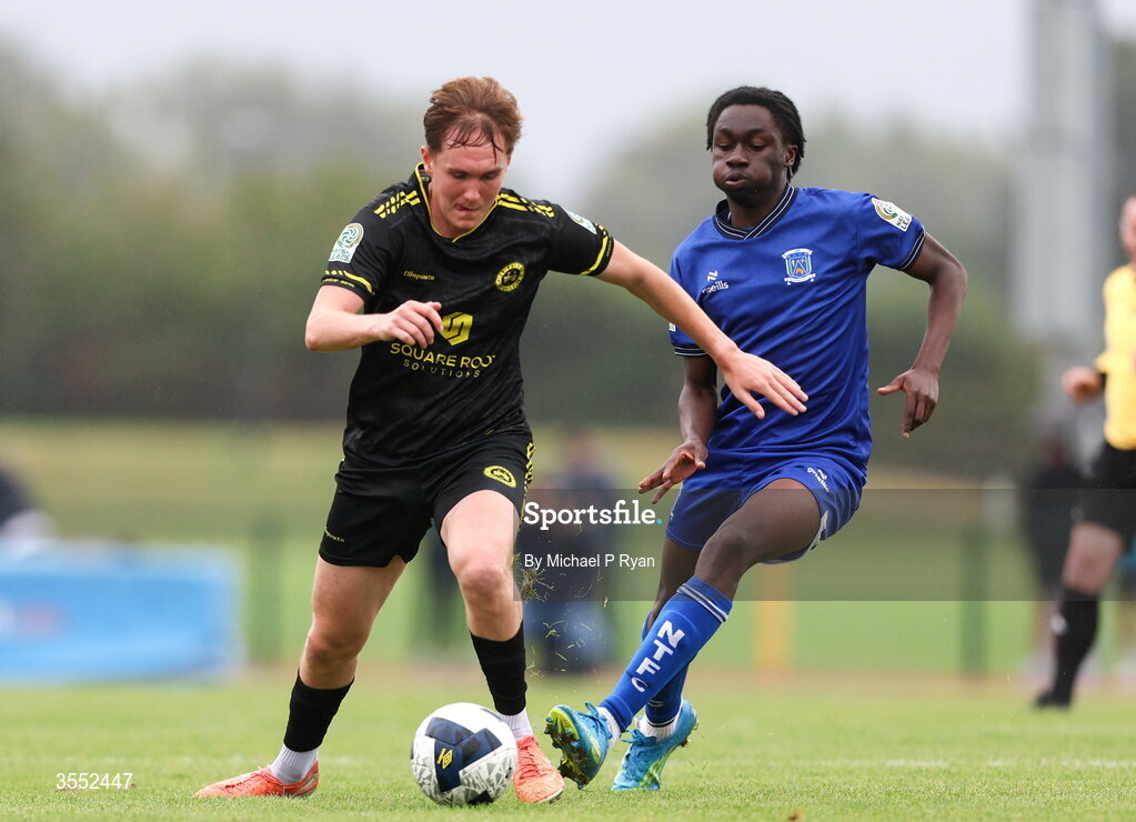 29 August 2026; Cian Carmody of CK United in action against Alex Akinrintoyo of Newbridge Town during the FAI National League Group 3 match between CK United and Newbridge Town at SETU Sports Complex in Carlow. Photo by Michael P Ryan/Sportsfile