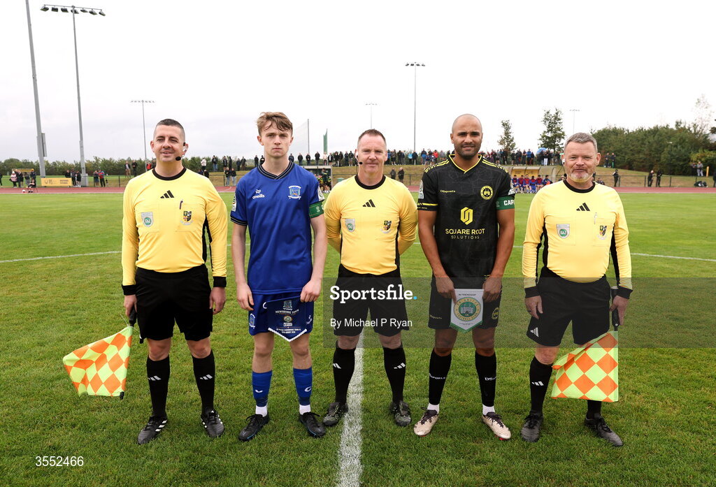 29 August 2026; Referee Patrick Sinnott, with his assistants Darren Keating, left, and  Phil McGrath, with team captains Nathan James McAuley of Newbridge Town and Ethan Boyle of CK United before the FAI National League Group 3 match between CK United and Newbridge Town at SETU Sports Complex in Carlow. Photo by Michael P Ryan/Sportsfile