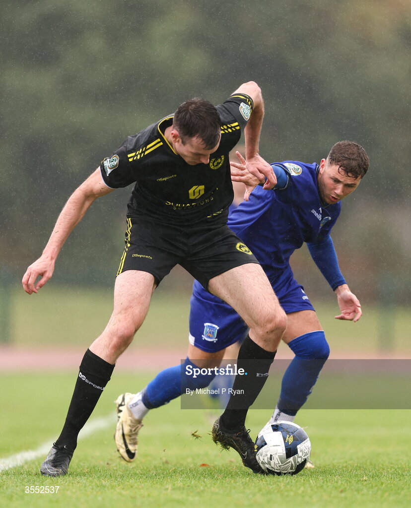 29 August 2026; Callum Warfield of CK United in action against Ethan Mills of Newbridge Town during the FAI National League Group 3 match between CK United and Newbridge Town at SETU Sports Complex in Carlow. Photo by Michael P Ryan/Sportsfile