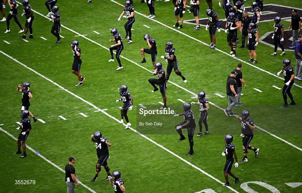 29 August 2026; TCU players warm up before the 2026 Aer Lingus College Football Classic match between TCU and North Carolina at the Aviva Stadium in Dublin. Photo by Seb Daly/Sportsfile