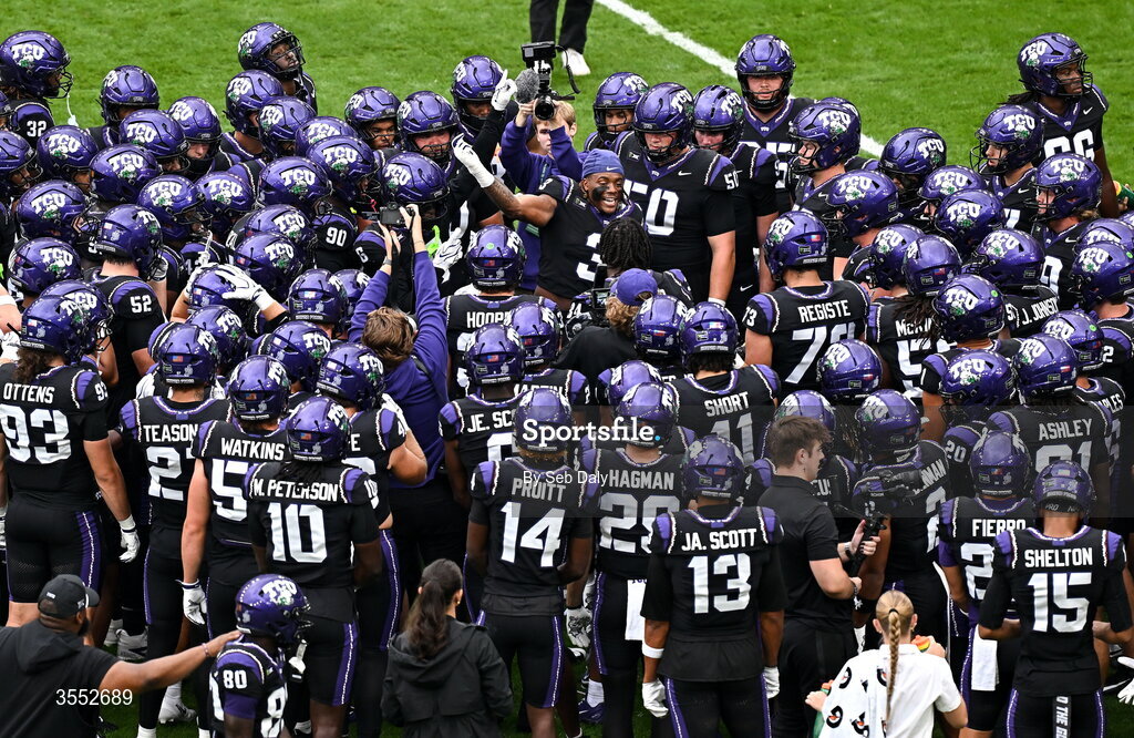 29 August 2026; TCU players huddle before the 2026 Aer Lingus College Football Classic match between TCU and North Carolina at the Aviva Stadium in Dublin. Photo by Seb Daly/Sportsfile
