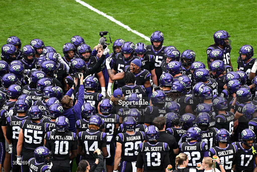 29 August 2026; TCU players huddle before the 2026 Aer Lingus College Football Classic match between TCU and North Carolina at the Aviva Stadium in Dublin. Photo by Seb Daly/Sportsfile