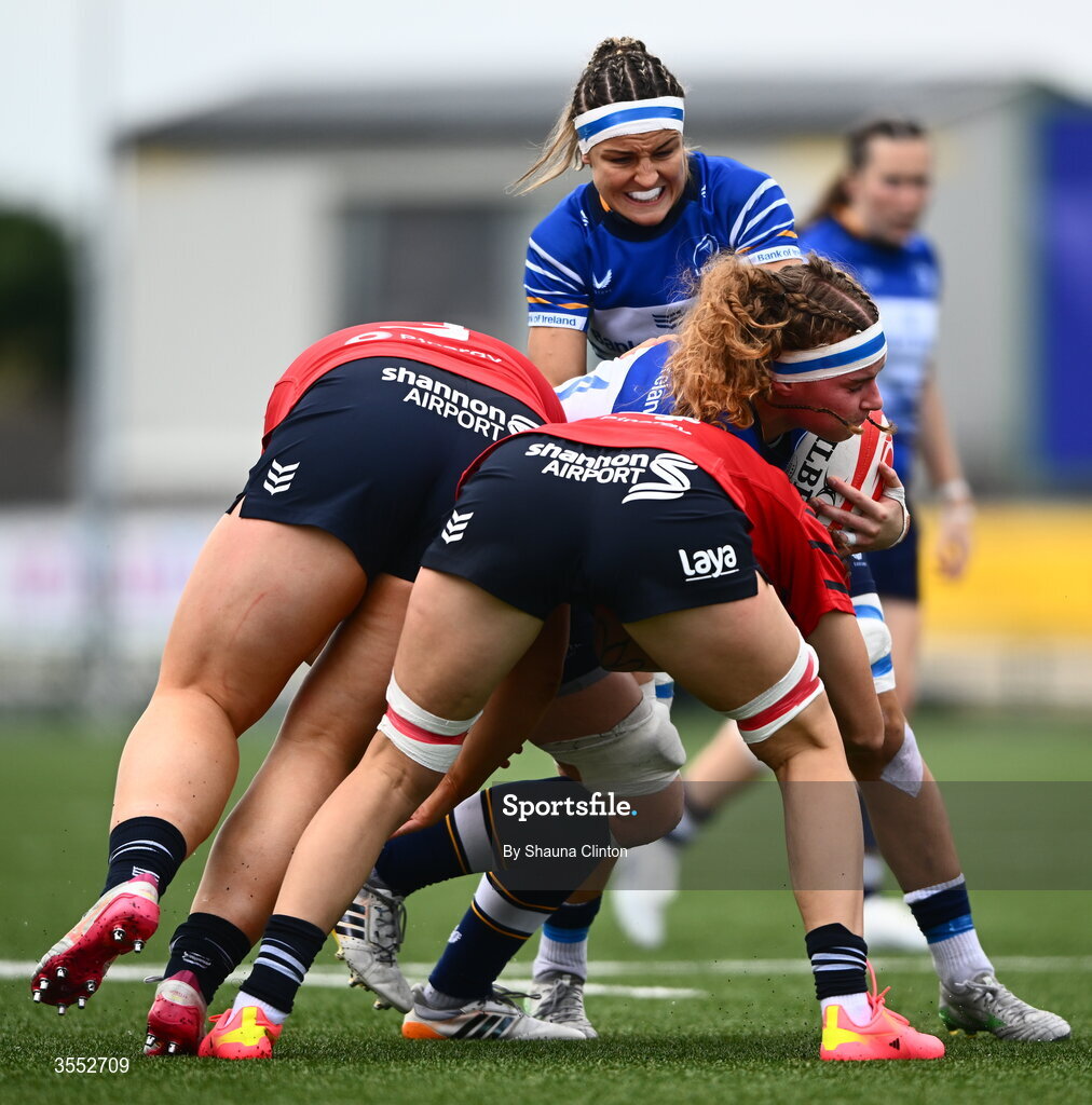 29 August 2026; Ruth Campbell of Leinster is tackled by Munster players Eilís Cahill, left, and Aoibhe O’Flynn during the Vodafone Womens Interprovincial Championship final match between Munster and Leinster at Dexcom Stadium in Galway. Photo by Shauna Clinton/Sportsfile