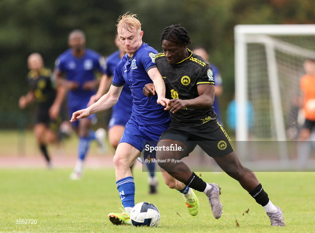 29 August 2026; Oluwafayosayemi Adeogun of CK United in action against Finn Cowper Gray of Newbridge Town during the FAI National League Group 3 match between CK United and Newbridge Town at SETU Sports Complex in Carlow. Photo by Michael P Ryan/Sportsfile