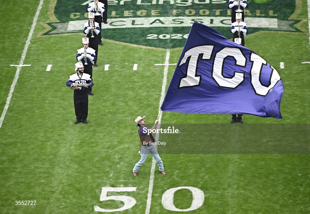 29 August 2026; A TCU flagbearer before the 2026 Aer Lingus College Football Classic match between TCU and North Carolina at the Aviva Stadium in Dublin. Photo by Seb Daly/Sportsfile