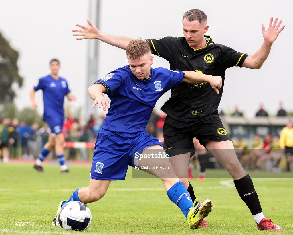 29 August 2026; Ruairi Brown of Newbridge Town in action against Shane Barnes of CK United during the FAI National League Group 3 match between CK United and Newbridge Town at SETU Sports Complex in Carlow. Photo by Michael P Ryan/Sportsfile