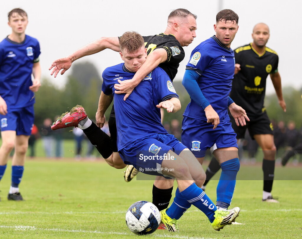 29 August 2026; Ruairi Brown of Newbridge Town in action against Shane Barnes of CK United during the FAI National League Group 3 match between CK United and Newbridge Town at SETU Sports Complex in Carlow. Photo by Michael P Ryan/Sportsfile