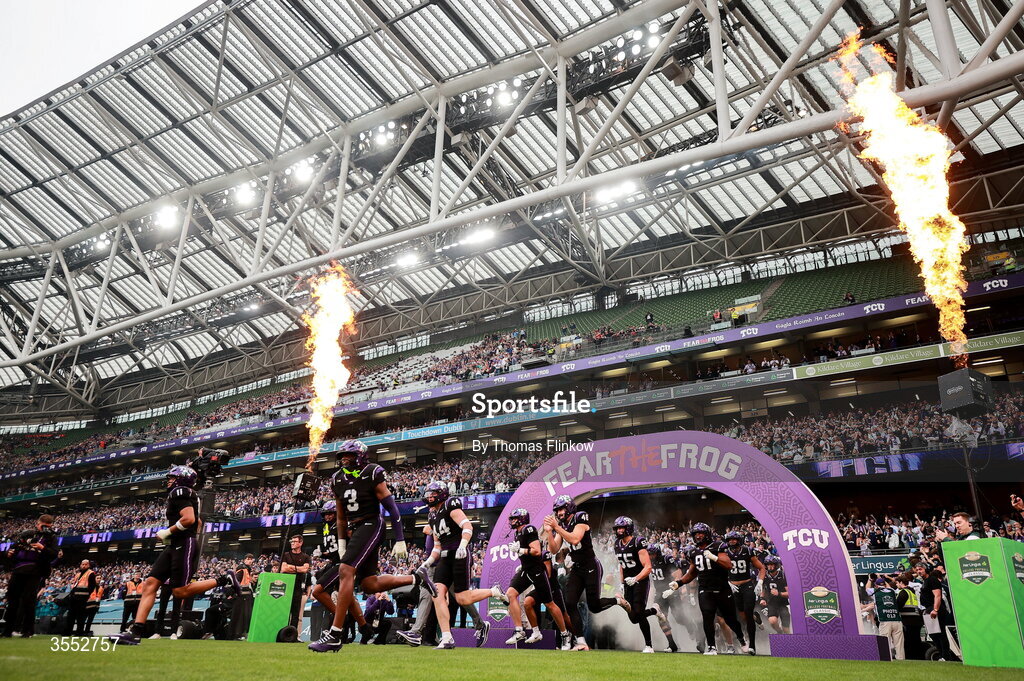 29 August 2026; TCU players run out before the 2026 Aer Lingus College Football Classic match between TCU and North Carolina at the Aviva Stadium in Dublin. Photo by Thomas Flinkow/Sportsfile