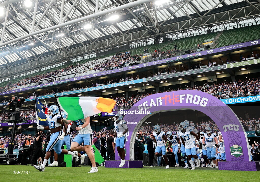 29 August 2026; North Carolina players run out before the 2026 Aer Lingus College Football Classic match between TCU and North Carolina at the Aviva Stadium in Dublin. Photo by Thomas Flinkow/Sportsfile