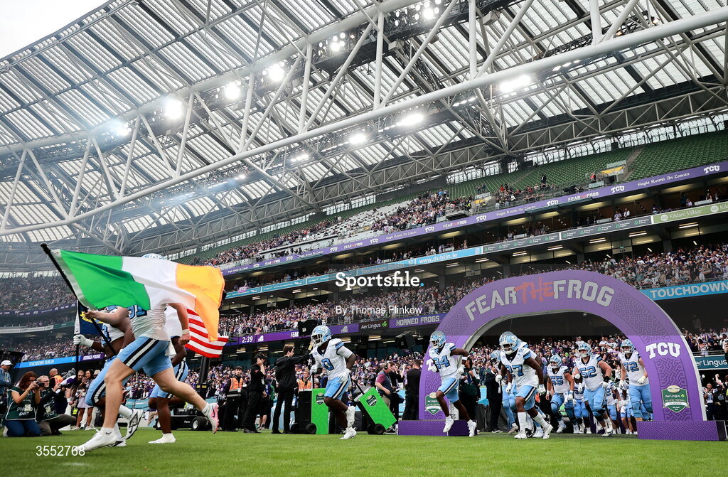 29 August 2026; North Carolina players run out before the 2026 Aer Lingus College Football Classic match between TCU and North Carolina at the Aviva Stadium in Dublin. Photo by Thomas Flinkow/Sportsfile