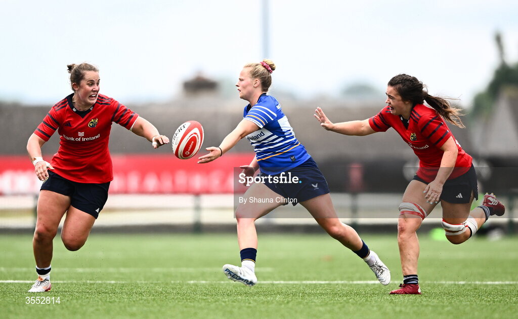 29 August 2026; Dannah O'Brien of Leinster in action against Munster players Enya Breen, left, and Maeve Óg O’Leary during the Vodafone Womens Interprovincial Championship final match between Munster and Leinster at Dexcom Stadium in Galway. Photo by Shauna Clinton/Sportsfile