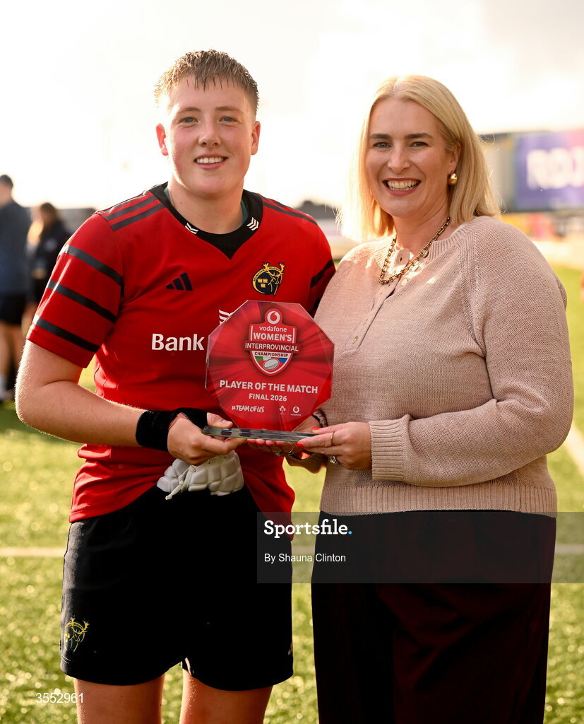 29 August 2026; Beth Buttimer of Munster is presented with the Vodafone Player of the Match award by Vodafone Ireland Brand Owner Orla Nagle after the Vodafone Womens Interprovincial Championship final match between Munster and Leinster at Dexcom Stadium in Galway. Photo by Shauna Clinton/Sportsfile