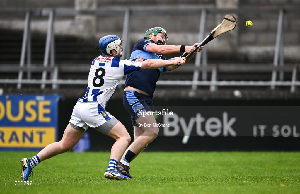 29 August 2026; Eoin McLoughlin of St Jude's scores his side's fourth goal despite the tackle of Eoin Behan of Ballyboden St Enda's during the PTSB Dublin Senior Club Hurling Championships Round 4 match between Ballyboden St Enda's and St Jude's at Parnell Park in Dublin. Photo by Ben McShane/Sportsfile