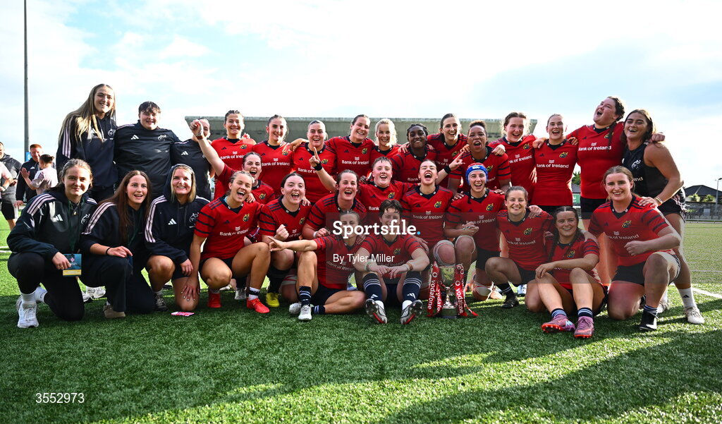 29 August 2026; The Munster players celebrate with the trophy after the Vodafone Womens Interprovincial Championship final match between Munster and Leinster at Dexcom Stadium in Galway. Photo by Tyler Miller/Sportsfile