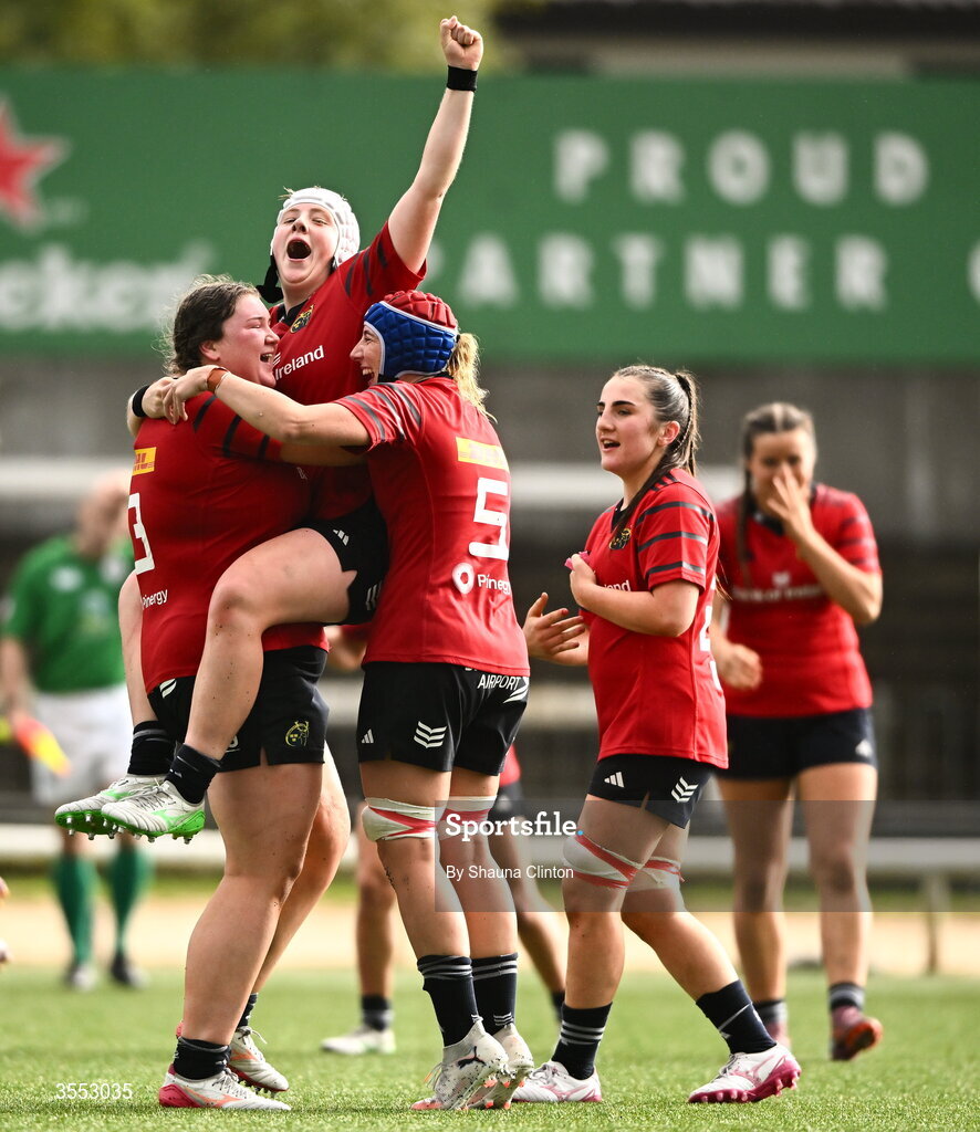 29 August 2026; Munster players, from left, Eilís Cahill, Beth Buttimer and Aoibhe O’Flynn celebrate after the Vodafone Womens Interprovincial Championship final match between Munster and Leinster at Dexcom Stadium in Galway. Photo by Shauna Clinton/Sportsfile