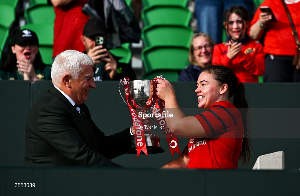 29 August 2026; IRFU President Tony O’Beirne presents the trophy to Maeve Óg O’Leary of Munster after the Vodafone Womens Interprovincial Championship final match between Munster and Leinster at Dexcom Stadium in Galway. Photo by Tyler Miller/Sportsfile