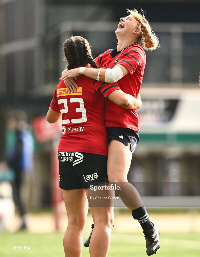 29 August 2026; Munster players Katie Corrigan, left, and Abbie Salter-Townshend celebrate after their side's victory in the Vodafone Womens Interprovincial Championship final match between Munster and Leinster at Dexcom Stadium in Galway. Photo by Shauna Clinton/Sportsfile