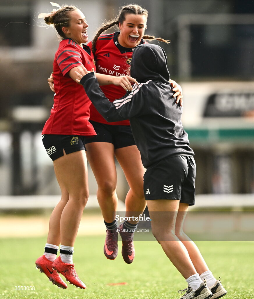 29 August 2026; Munster players Lucia Linn, left, and Katie Corrigan celebrate after the Vodafone Womens Interprovincial Championship final match between Munster and Leinster at Dexcom Stadium in Galway. Photo by Shauna Clinton/Sportsfile