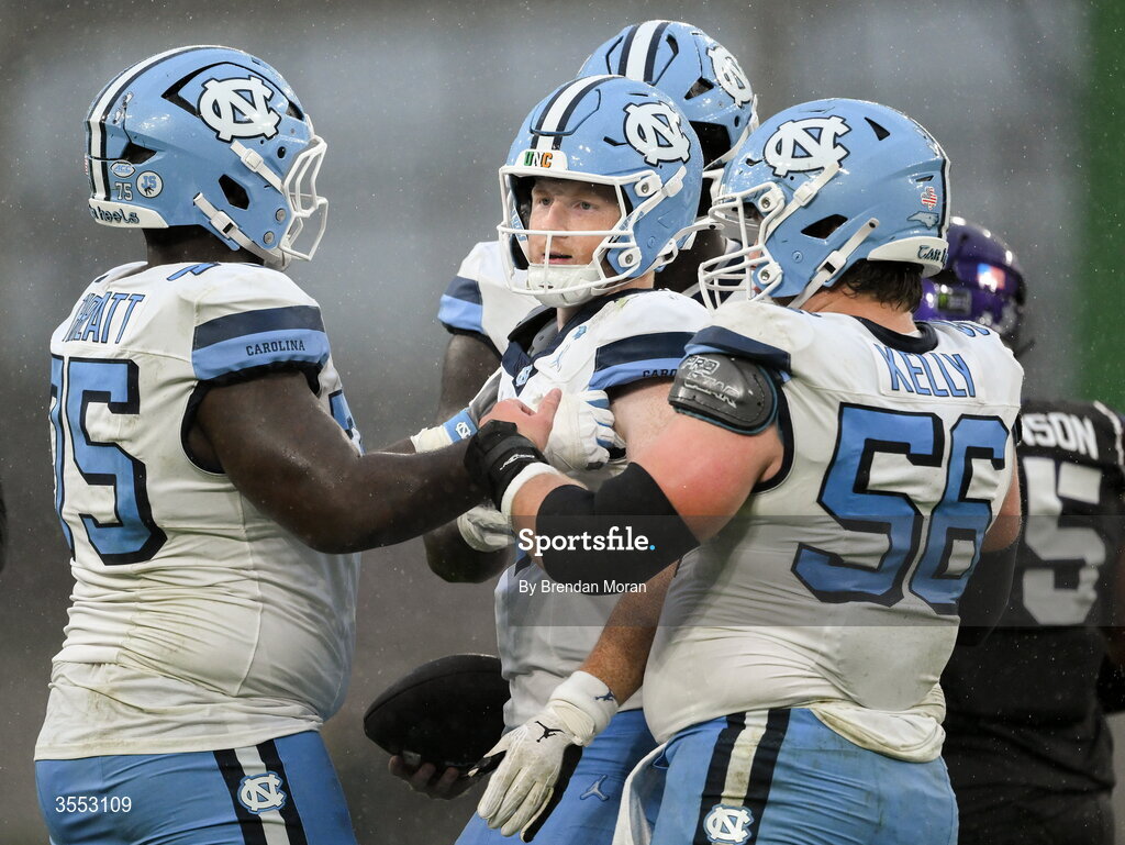 29 August 2026; North Carolina quarterback Billy Edwards Jr #9 is helped up by teammates during the 2026 Aer Lingus College Football Classic match between TCU and North Carolina at the Aviva Stadium in Dublin. Photo by Brendan Moran/Sportsfile