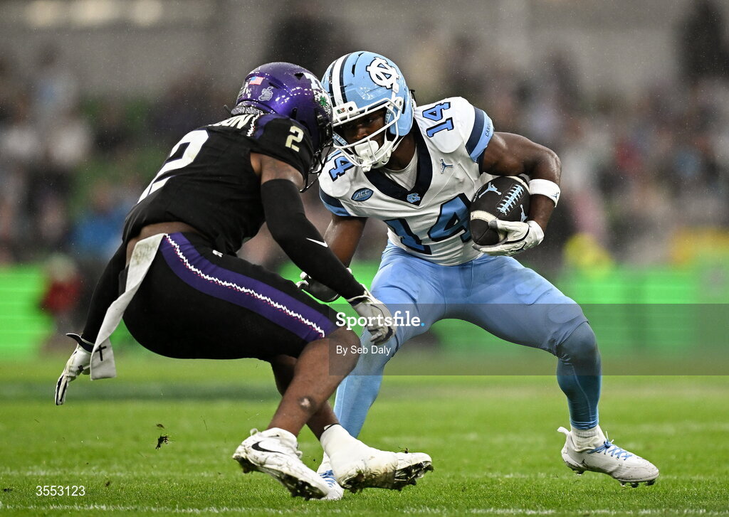 29 August 2026; North Carolina wide receiver CJ Sadler #14 in action against TCU safety Jamel Johnson #2 during the 2026 Aer Lingus College Football Classic match between TCU and North Carolina at the Aviva Stadium in Dublin. Photo by Seb Daly/Sportsfile
