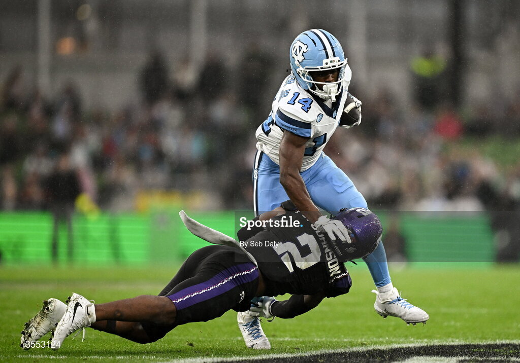 29 August 2026; North Carolina wide receiver CJ Sadler #14 in action against TCU safety Jamel Johnson #2 during the 2026 Aer Lingus College Football Classic match between TCU and North Carolina at the Aviva Stadium in Dublin. Photo by Seb Daly/Sportsfile