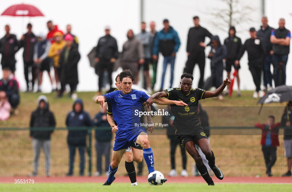 29 August 2026; Raveli Kilonda of CK United in action against Conan Kruger of Newbridge Town during the FAI National League Group 3 match between CK United and Newbridge Town at SETU Sports Complex in Carlow. Photo by Michael P Ryan/Sportsfile