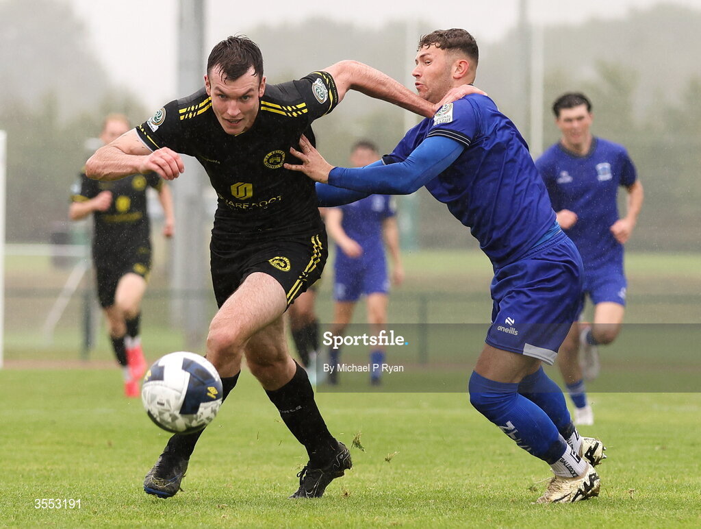 29 August 2026; Callum Warfield of CK United in action against Ethan Mills of Newbridge Town during the FAI National League Group 3 match between CK United and Newbridge Town at SETU Sports Complex in Carlow. Photo by Michael P Ryan/Sportsfile