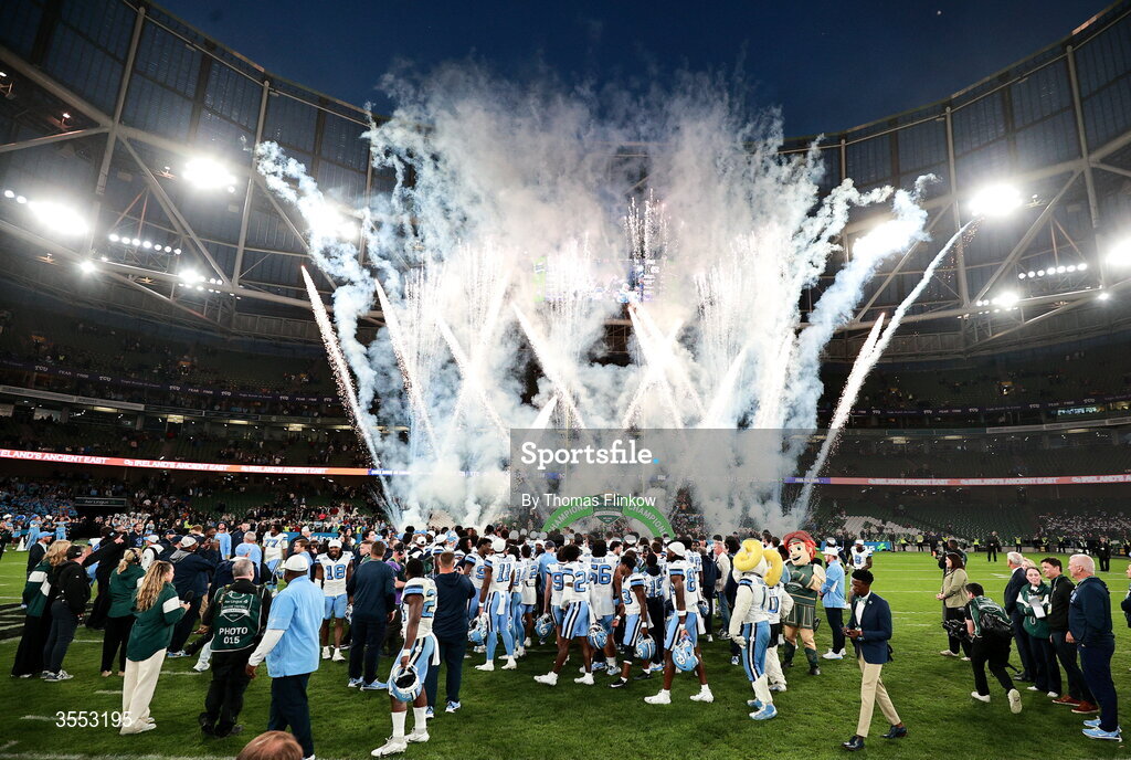 29 August 2026; North Carolina players celebrate with the trophy after their side's victory in the 2026 Aer Lingus College Football Classic match between TCU and North Carolina at the Aviva Stadium in Dublin. Photo by Thomas Flinkow/Sportsfile