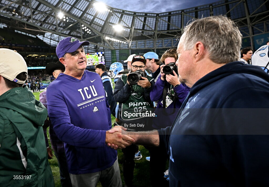 29 August 2026; TCU head coach Sonny Dykes and North Carolina Head Coach Bill Belichick shake hands after the 2026 Aer Lingus College Football Classic match between TCU and North Carolina at the Aviva Stadium in Dublin. Photo by Seb Daly/Sportsfile